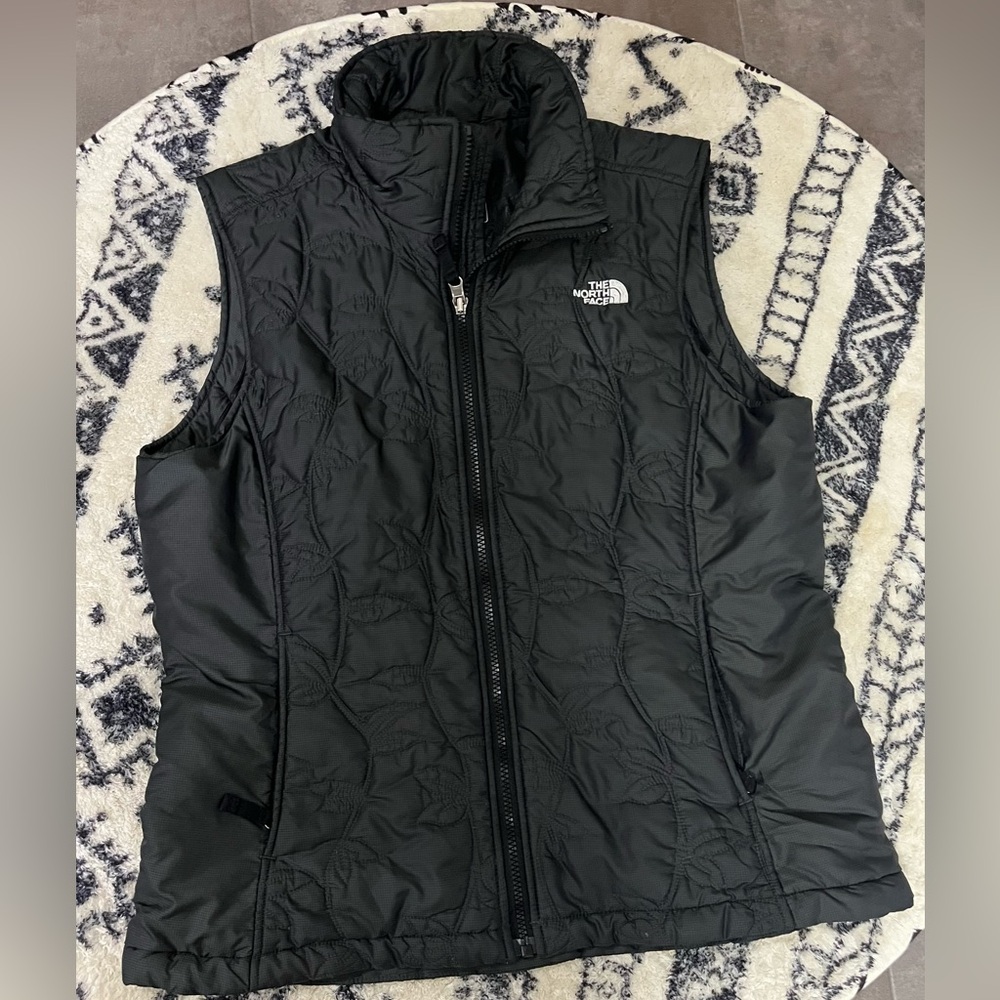 The North Face quilted vest size Large